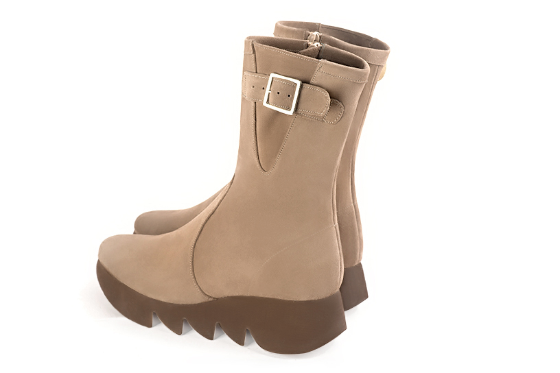 Tan beige women's ankle boots with a zip on the inside. Round toe. Low rubber soles. Rear view - Florence KOOIJMAN